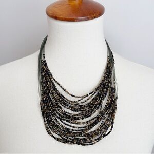 Seed Bead Floating Necklace Black Gold Multi Strand Metal Clasp NWOT
